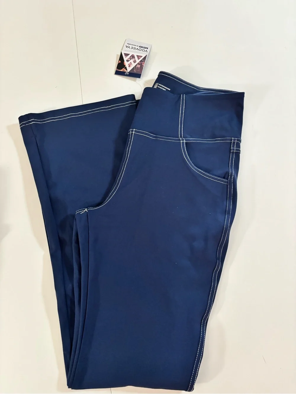 Navy High-Rise Stretch Jeggings with Contrast Stitching.